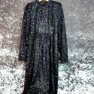 A beautiful black shimmer shorts jumpsuit